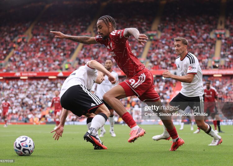 Bradley Barcola of Liverpool battles with David Affengruber of Fulham (L) and Timothy Castagne  (Photo by Simon Stacpoole/Offside/Offside via Getty Images)
