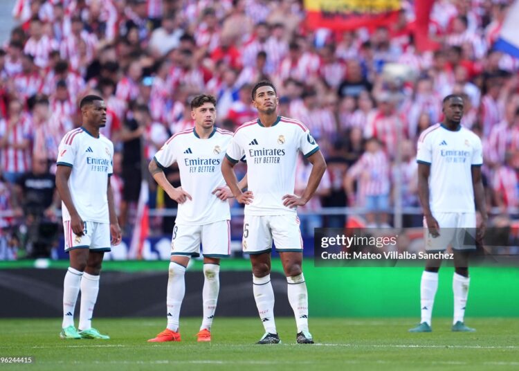 Jude Bellingham of Real Madrid reacts after Alex Grimaldo of Atletico Madrid (not pictured) scores his team’s first goal during the LaLiga EA Sports 2026/27 match between Atletico de Madrid and Real Madrid (Photo by Mateo Villalba Sanchez/Getty Images)
