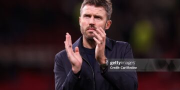 Michael Carrick, Manager of Manchester United, acknowledges the fans (Photo by Carl Recine/Getty Images)