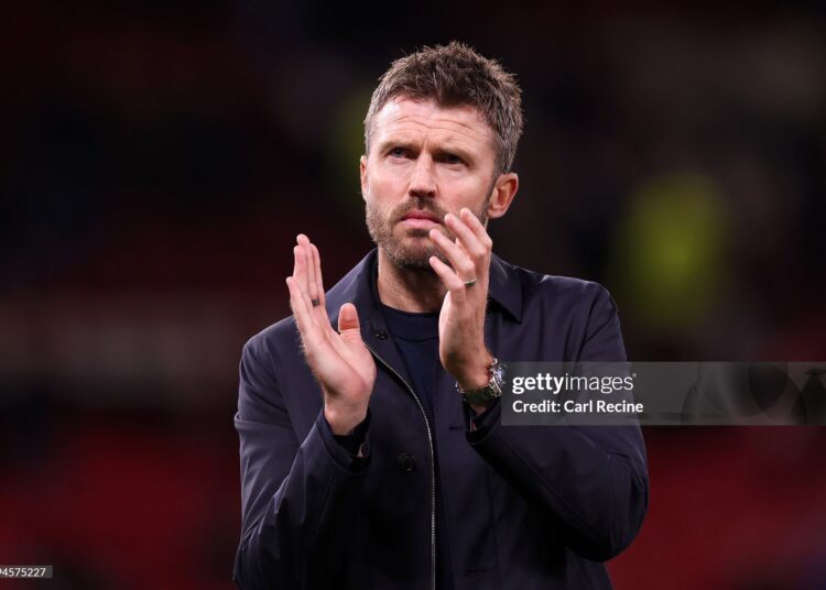 Michael Carrick, Manager of Manchester United, acknowledges the fans (Photo by Carl Recine/Getty Images)