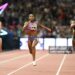(L-R) Amy Hunt of Team Great Britain, Melissa Jefferson-Wooden of Team United States, and Ashanti Moore of Team Jamaica, compete in the Women's 200m Final on Day 3 of the World Athletics Ultimate Championship (Photo by Matthias Hangst/Getty Images)