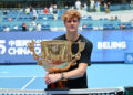 BEIJING, CHINA - OCTOBER 01: Jannik Sinner of Italy poses with his trophy during the medal ceremony after winning the Men's Singles final match against Learner Tien of the United States on day 10 of 2025 China Open at National Tennis Center on October 01, 2025 in Beijing, China. (Photo by Lintao Zhang/Getty Images)