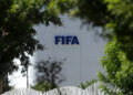 The FIFA logo is seen at its Africa regional office in Sale on August 5, 2026. President Gianni Infantino held emergency talks with other FIFA directors in Morocco on August 5, a source told AFP, amid a wave of criticism over his now shelved plan to open the World Cup to private investment. (Photo by Abdelmajid BZIOUAT / AFP via Getty Images)