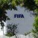 The FIFA logo is seen at its Africa regional office in Sale on August 5, 2026. President Gianni Infantino held emergency talks with other FIFA directors in Morocco on August 5, a source told AFP, amid a wave of criticism over his now shelved plan to open the World Cup to private investment. (Photo by Abdelmajid BZIOUAT / AFP via Getty Images)