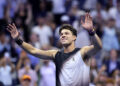 NEW YORK, NEW YORK - SEPTEMBER 08: Ben Shelton of the United States celebrates match point against Carlos Alcaraz of Spain during their Men's Singles Quarterfinal match on Day Ten of the 2026 US Open at USTA Billie Jean King National Tennis Center on September 08, 2026 in the Flushing neighborhood of the Queens borough of New York City. (Photo by Julian Finney/Getty Images)