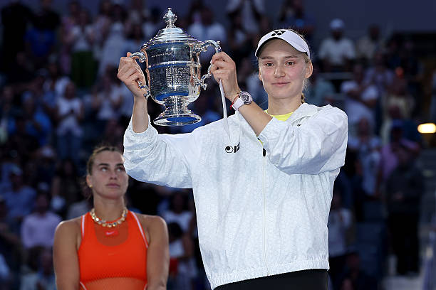 NEW YORK, NEW YORK - SEPTEMBER 12: Elena Rybakina of Kazakhstan celebrates with the trophy after defeating Aryna Sabalenka in their Women's Singles Final match on Day Fourteen of the 2026 US Open at USTA Billie Jean King National Tennis Center on September 12, 2026 in the Flushing neighborhood of the Queens borough of New York City. (Photo by Sarah Stier/Getty Images)
