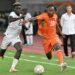 Ivory Coast's forward #10 Yan Diomandé (R) fights for the ball with Ghana's defender #21 Kojo Peprah Oppong during the Africa Cup of Nations 2027 qualifying football match between Ivory Coast and Ghana at the Stade de Bouake on September 24, 2026. (Photo by Issouf SANOGO / AFP via Getty Images)