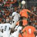 Ivory Coast's defender #21 Evan Ndicka heads the ball during the Africa Cup of Nations 2027 qualifying football match between Ivory Coast and Ghana at the Stade de Bouake on September 24, 2026. (Photo by Issouf SANOGO / AFP via Getty Images)