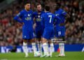 Morgan Rogers, Jordan Henderson, Pedro Neto and Danny Welbeck of Chelsea talk while standing over a freekick during the Carabao Cup Fourth Round match between Liverpool and Chelsea (Photo by Darren Walsh/Chelsea FC via Getty Images)