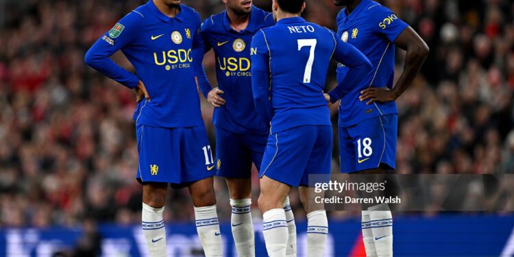 Morgan Rogers, Jordan Henderson, Pedro Neto and Danny Welbeck of Chelsea talk while standing over a freekick during the Carabao Cup Fourth Round match between Liverpool and Chelsea (Photo by Darren Walsh/Chelsea FC via Getty Images)