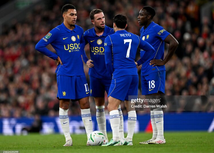Morgan Rogers, Jordan Henderson, Pedro Neto and Danny Welbeck of Chelsea talk while standing over a freekick during the Carabao Cup Fourth Round match between Liverpool and Chelsea (Photo by Darren Walsh/Chelsea FC via Getty Images)
