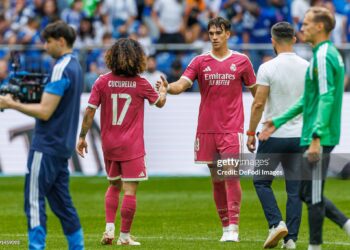 Marc Cucurella of Real Madrid CF and Carlos Espi of Real Madrid CF gestures during the during the Pre-Season Friendly match between FC Schalke 04 and Real Madrid (Photo by Mario Hommes/DeFodi Images/DeFodi via Getty Images)