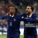 Michael Olise of France celebrates scoring his team’s first goal with teammate Rayan Cherki during the UEFA Nations League 2026/27 group phase match between France and Italy (Photo by Pauline Figuet/Getty Images)