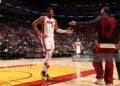 Giannis Antetokounmpo #7 and Nick Richards #8 of the Miami Heat high five during the game against the Minnesota Timberwolves (Photo by Issac Baldizon/NBAE via Getty Images)