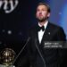 England and Bayern Munich forward Harry Kane reacts after receiving the Ballon d'Or award for the best male footballer during the 2026 Ballon d'Or (Photo by FRANCK FIFE / AFP via Getty Images)