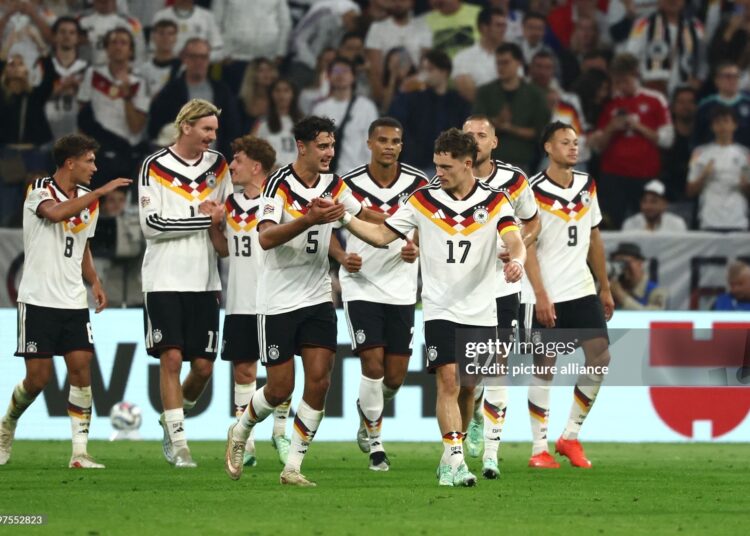 Florian Wirtz (Germany. 3vr) celebrates his goal to make it 2-0 with his teammates. Photo: Christian Charisius/dpa - IMPORTANT NOTICE: In accordance with the regulations of the Bundesliga and the German Football Association (Photo by Christian Charisius/picture alliance via Getty Images)