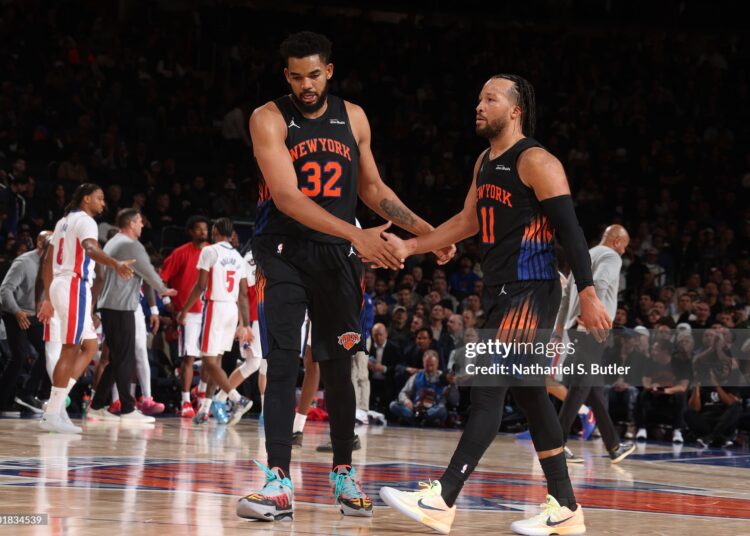 Karl-Anthony Towns #32, and Jalen Brunson #11 of the New York Knicks high five during the game against the Detroit Pistons (Photo by Nathaniel S. Butler/NBAE via Getty Images)