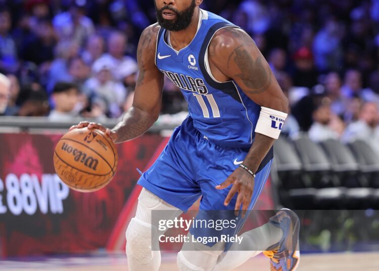 Kyrie Irving #11 of the Dallas Mavericks dribbles the ball during the game against the Houston Rockets (Photo by Logan Riely/NBAE via Getty Images)