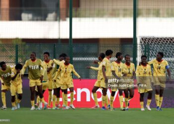 Players of Ghana celebrate after Cynthia Obinsrewuo (obscured) scores her team’s first goal during the FIFA U17 Women's World Cup Round of 16 match between Argentina and Ghana (Photo by Judit Cartiel - FIFA/FIFA via Getty Images)