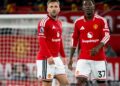 Luke Shaw and Kobbie Mainoo of Manchester United look on during the Premier League 2026/27 match between Manchester United and Tottenham Hotspur (Photo by Ash Donelon/Manchester United via Getty Images)