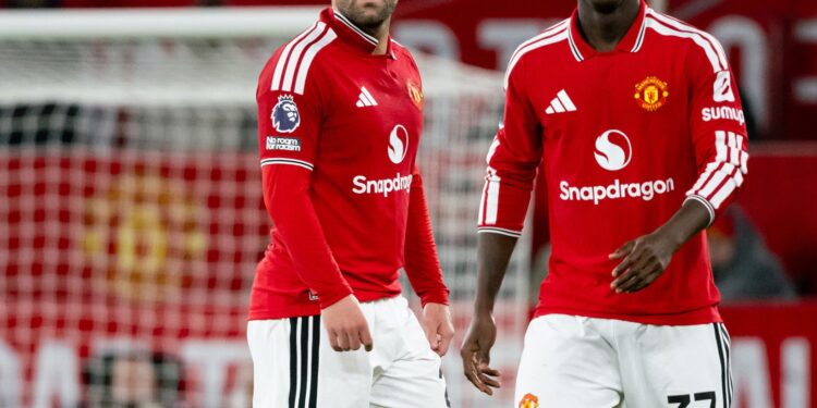Luke Shaw and Kobbie Mainoo of Manchester United look on during the Premier League 2026/27 match between Manchester United and Tottenham Hotspur (Photo by Ash Donelon/Manchester United via Getty Images)