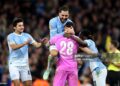 Rayan Cherki, Geronimo Rulli and Jeremy Doku of Manchester City celebrate winning the penalty shootout agter the Carabao Cup Fourth Round match between Manchester City and Brighton & Hove Albion (Photo by Jan Kruger/Getty Images)