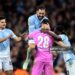 Rayan Cherki, Geronimo Rulli and Jeremy Doku of Manchester City celebrate winning the penalty shootout agter the Carabao Cup Fourth Round match between Manchester City and Brighton & Hove Albion (Photo by Jan Kruger/Getty Images)