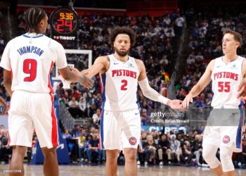 Cade Cunningham #2 and Duncan Robinson #55 of the Detroit Pistons high five during the game against the Boston Celtics (Photo by Brian Sevald/NBAE via Getty Images)