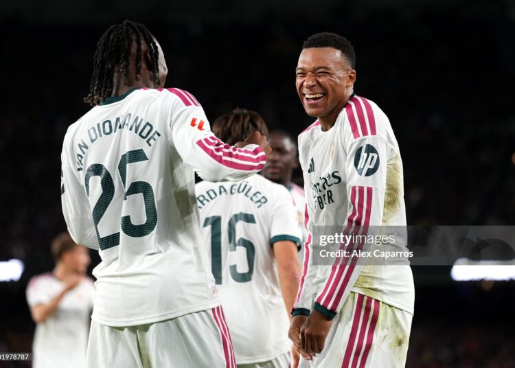 Kylian Mbappe of Real Madrid celebrates scoring his team’s first goal with teammate Yan Diomande during the LaLiga EA Sports 2026/27 match between FC Barcelona and Real Madrid (Photo by Alex Caparros/Getty Images)
