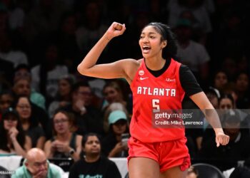 Angel Reese #5 of the Atlanta Dream celebrates during the game against the New York Liberty during Semi-Finals Game 3 (Photo by Mike Lawrence/NBAE via Getty Images)