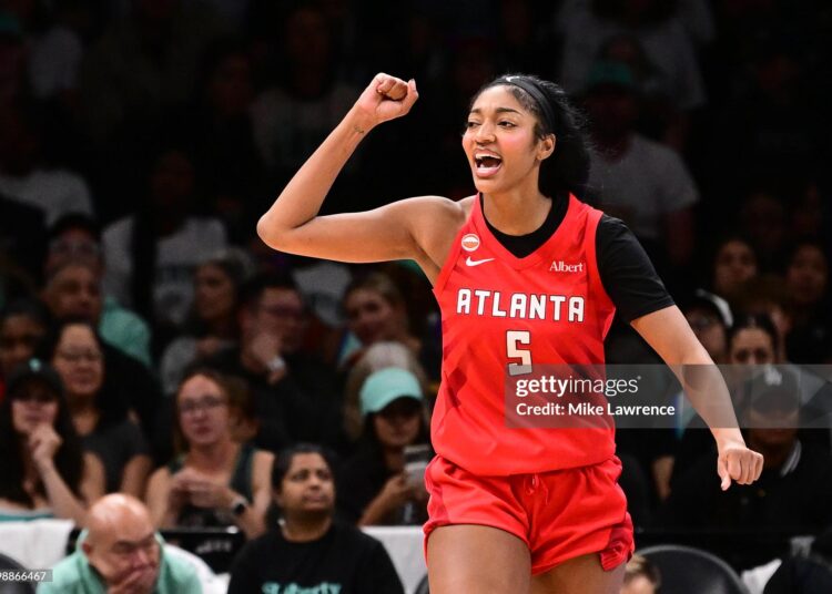Angel Reese #5 of the Atlanta Dream celebrates during the game against the New York Liberty during Semi-Finals Game 3 (Photo by Mike Lawrence/NBAE via Getty Images)
