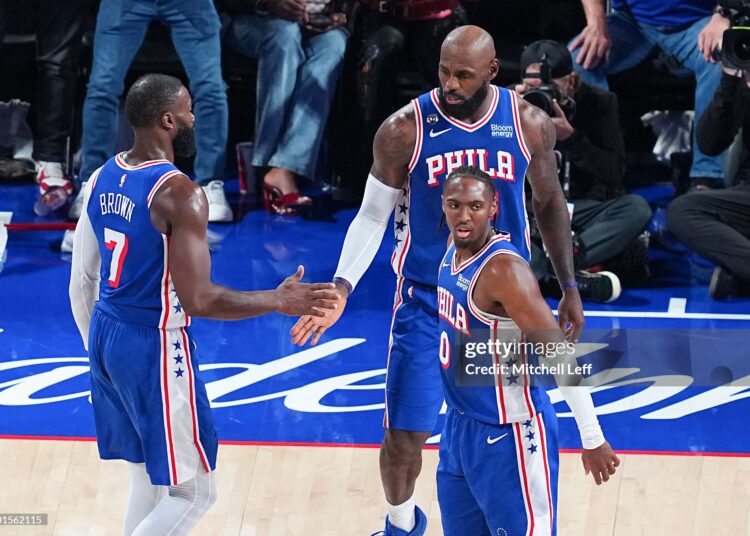 LeBron James #23 celebrates with Jaylen Brown #7 and Tyrese Maxey #0 of the Philadelphia 76ers during the fourth quarter against the Cleveland Cavaliers (Photo by Mitchell Leff/Getty Images)