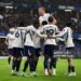 Tottenham Hotspur players celebrate after Mike Penders of Chelsea scores an own goal, the first goal for Tottenham Hotspur during the Premier League 2026/27 match between Chelsea FC and Tottenham Hotspur at Stamford Bridge (Photo by Mike Hewitt/Getty Images)