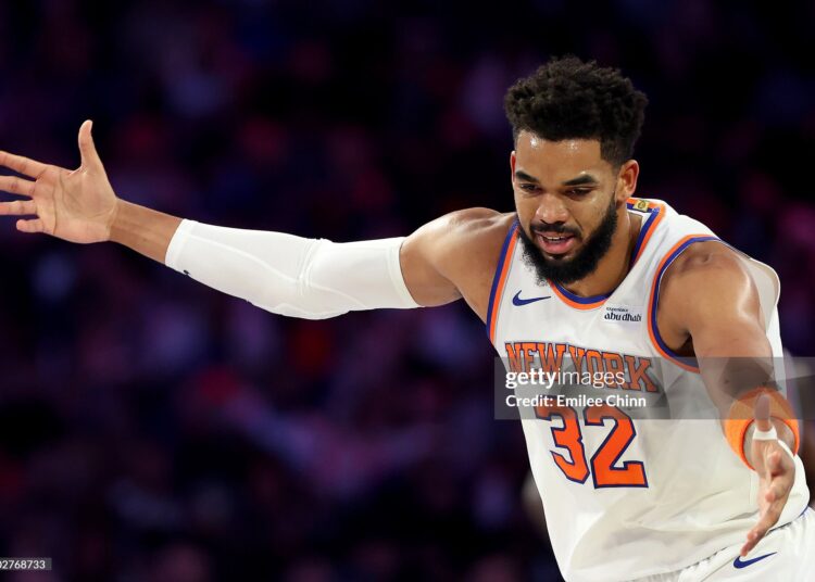 Karl-Anthony Towns #32 of the New York Knicks celebrates a basket during the first half of an Emirates NBA Cup game against the Philadelphia 76ers (Photo by Emilee Chinn/Getty Images)