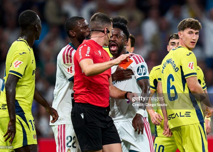 Vinicius Junior of Real Madrid CF argue with referee Isidro Diaz Mero Escuderos red card during the LaLiga EA Sports 2026/27 match between Real Madrid and Villarreal CF. (Photo by Diego Souto/Getty Images)