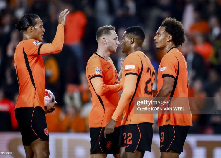 Netherlands' forward #09 Joshua Zirkzee (R) celebrates scoring his team's second goal with teammates during the UEFA Nations League football Group A2 match between the Netherlands and Serbia (Photo by Koen van Weel / ANP / AFP via Getty Images) / Netherlands OUT
