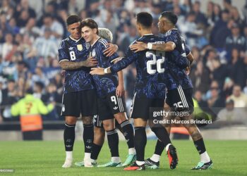 Julian Alvarez of Argentina celebrates his team's second goal with teammates scored by an own goal from Maumouni Diallo of Burkina Faso (not in frame) during the international friendly match between Argentina and Burkina Faso at Estadio Monumental Antonio V. Liberti on October 03, 2026 in Buenos Aires, Argentina. (Photo by Marcos Brindicci/Getty Images)