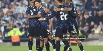 Julian Alvarez of Argentina celebrates his team's second goal with teammates scored by an own goal from Maumouni Diallo of Burkina Faso (not in frame) during the international friendly match between Argentina and Burkina Faso at Estadio Monumental Antonio V. Liberti on October 03, 2026 in Buenos Aires, Argentina.  (Photo by Marcos Brindicci/Getty Images)