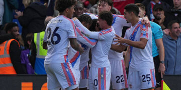 Crystal Palace's Colombian midfielder #08 Jefferson Lerma celebrates with teammates after scoring their second goal during the English Premier League football match between Crystal Palace and Nottingham Forest at Selhurst Park in south London on October 11, 2026. (Photo by Ben Stansall / AFP via Getty Images) / RESTRICTED TO EDITORIAL USE. No use with unauthorized audio, video, data, fixture lists, club/league logos or 'live' services. Online in-match use limited to 120 images. An additional 40 images may be used in extra time. No video emulation. Social media in-match use limited to 120 images. An additional 40 images may be used in extra time. No use in betting publications, games or single club/league/player publications. /