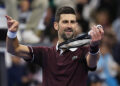 Novak Djokovic of Serbia celebrates after winning the Men's Singles quarterfinal match against Alexander Zverev of Germany on day five of China Open at the National Tennis Center on October 04, 2026 in Beijing, China. (Photo by Lintao Zhang/Getty Images)