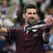 Novak Djokovic of Serbia celebrates after winning the Men's Singles quarterfinal match against Alexander Zverev of Germany on day five of China Open at the National Tennis Center on October 04, 2026 in Beijing, China. (Photo by Lintao Zhang/Getty Images)