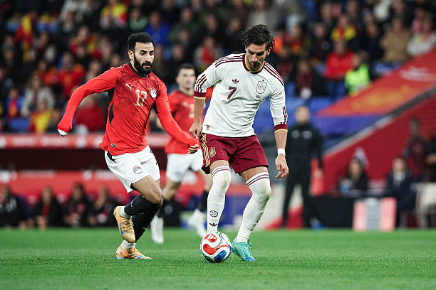 Ferran Torres of Spain controls the ball while being defended by Mohanad Lasheen of Egypt during an international friendly match between Spain and Egypt at RCD Stadium in Barcelona, Spain, on March 31, 2026. The match takes place prior to the FIFA World Cup. (Photo by Gongora/NurPhoto via Getty Images)