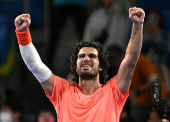 Spain's Carlos Alcaraz celebrates his victory against compatriot Jaume Munar in their men's singles semi-final tennis match at the ATP Tour Japan Open Tennis Championships at the Ariake Tennis Forest Park in Tokyo on October 5, 2026. (Photo by Rie KIKUCHI / AFP via Getty Images)