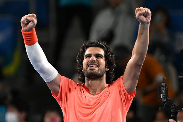 Spain's Carlos Alcaraz celebrates his victory against compatriot Jaume Munar in their men's singles semi-final tennis match at the ATP Tour Japan Open Tennis Championships at the Ariake Tennis Forest Park in Tokyo on October 5, 2026. (Photo by Rie KIKUCHI / AFP via Getty Images)