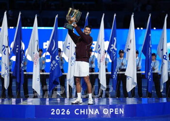 BEIJING, CHINA - OCTOBER 6: Novak Djokovic of Serbia pose with the trophy after winning against Alex De Minaur of Australia during their Men's Singles final match on day seven of China Open at the National Tennis Center on October 6, 2026 in Beijing, China. (Photo by Fred Lee/Getty Images)