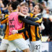 Mohamed Belloumi, Joe Gelhardt and Regan Slater of Hull City celebrate 1st goal during the Premier League 2026/27 match between Hull City and Everton at MKM Stadium on October 11, 2026 in Hull, United Kingdom. (Photo by Richard Sellers/Sportsphoto/Allstar via Getty Images)